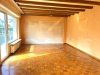 Wohnen & Vermieten in Mühlheim – Dreifamilienhaus mit Platz für Ihre Pläne - Wohnzimmer EG