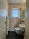 Exklusives 3-Familienhaus, Gartenidylle und hochwertiger Ausstattung in Seligenstadt Klein-Welzheim - Gäste-WC 1.OG