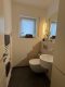 Exklusives 3-Familienhaus, Gartenidylle und hochwertiger Ausstattung in Seligenstadt Klein-Welzheim - Gäste-WC EG