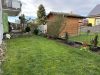 Attraktive 3-Zimmer-Wohnung mit Balkon & TG-Stellplatz in Feldrandlage von Mainflingen - Gemeinschaftlicher Garten