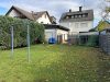 Ein Ort zum Ankommen – Einfamilienhaus mit Nebengebäude in Hainstadt sucht neue Geschichten - Rückansicht Haus