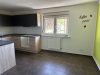 Attraktives Wohnensemble mit zwei Häusern und vier Wohneinheiten in Feldrandlage von Limeshain - Küche OG Neubau