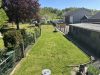 Attraktives Wohnensemble mit zwei Häusern und vier Wohneinheiten in Feldrandlage von Limeshain - Garten