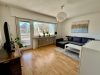 Charmante 2-Zimmer-Wohnung mit XXL-Terrasse (ca. 30 m²) & Stellplatz - Wohnzimmer Ansicht