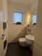 Exklusives 3-Familienhaus, Gartenidylle und hochwertiger Ausstattung in Seligenstadt Klein-Welzheim - Gäste-WC EG