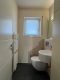 Exklusives 3-Familienhaus, Gartenidylle und hochwertiger Ausstattung in Seligenstadt Klein-Welzheim - Gäste-WC 1.OG