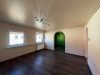 Familienfreundliches Zweifamilienhaus mit großem Garten und vielseitigem Potenzial. - Ansicht Wohnzimmer OG
