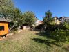 Familienfreundliches Zweifamilienhaus mit großem Garten und vielseitigem Potenzial. - Gartenansicht
