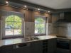 Großzügige Erdgeschosswohnung mit Garten, Terrasse und vielseitig nutzbarem Untergeschoss - Ansicht Küche