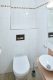 Exklusives Wohnen mit privatem Wellnessbereich – stilvolles Haus mit hochwertiger Ausstattung - Gäste-WC im EG
